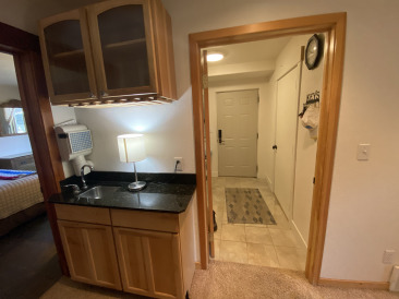 2021-08-11-588-LakeView-Circle-West-27-WetBar-near-Mudroom-Laundry.jpg