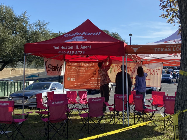 2021-11-13-UT-Football-02-Travis-helping-setup-tailgate.jpg