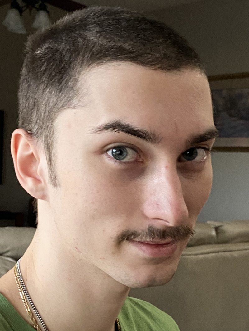 2021-11-23-Dax-shaved-cheesy-mustache.jpg