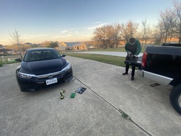 2021-12-22-Dax-installs-license-plate-1.JPG