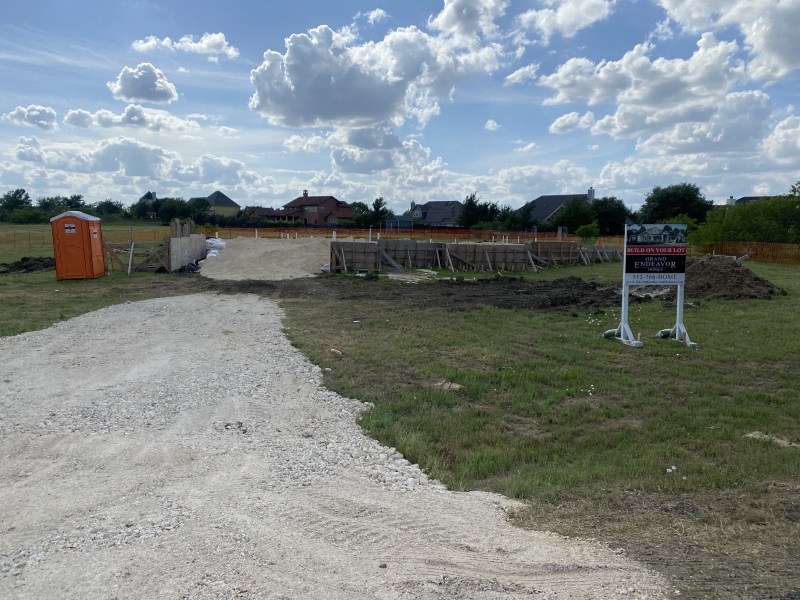 2022-04-28-new-house-behind-ours.JPG