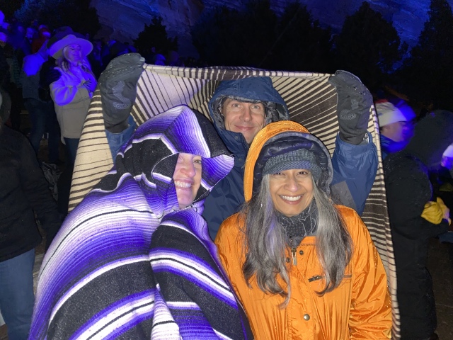 2022-05-03-Colorado-53-RedRocks-Jason-Isbell-Concert-Suzi-Ben-Kavita-rain-blanket-GOOD.JPG