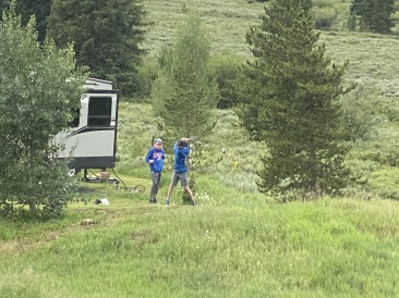 2022-07-15-Colorado-07-neighbors-golfing-into-National-Forest.JPG