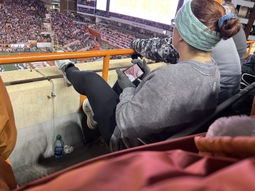 2022-11-12-UT-Longhorn-Football-83-lady-watching-surgeries.JPG