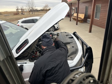 2022-11-07-SouthDakota-Pheasant-Hunting-16-Dead-battery-in-truck-Mike.JPG