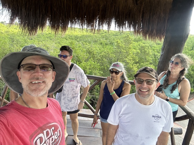 2022-11-30-Cancun-with-Friends-11-Tower-Travis-Kavita-Ren-Suzi.JPG