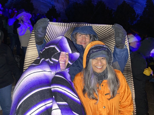 2022-05-03-Colorado-53-RedRocks-Jason-Isbell-Concert-Suzi-Ben-Kavita-rain-blanket-GOOD.JPG