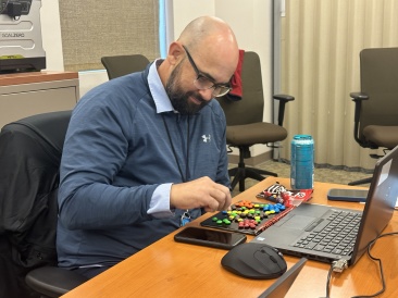 2023-01-10-VA-SAVD-San-Diego-01-Jonathan-sorting-MandMs.JPG