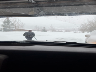 2023-03-31-Travis-Shoveling-snow-Breckenridge.png