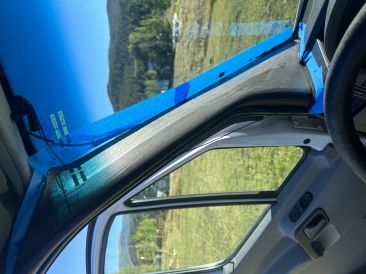 2023-09-20-Sprinter-black-stain-on-windshield-trim-1.JPG