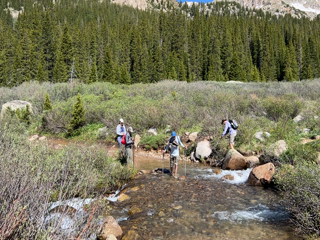 2023-07-01-Creek-Crossing-ValeCabin-Stan-Ben-Kavita-McKenzie.png