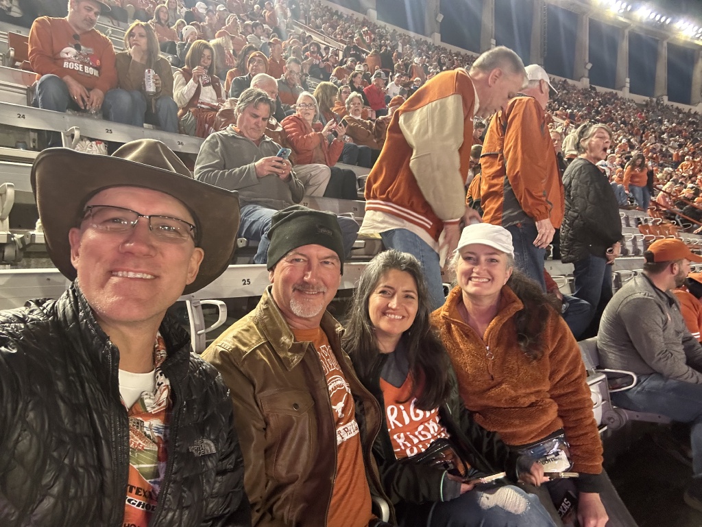 2023-11-24-UT-Football-65-Travis-Suzi-Mike-Graciella-GOOD.JPG