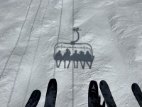 2024-03-17-Colorado-12-Ski-Lift-Shadow-pigtails.JPG