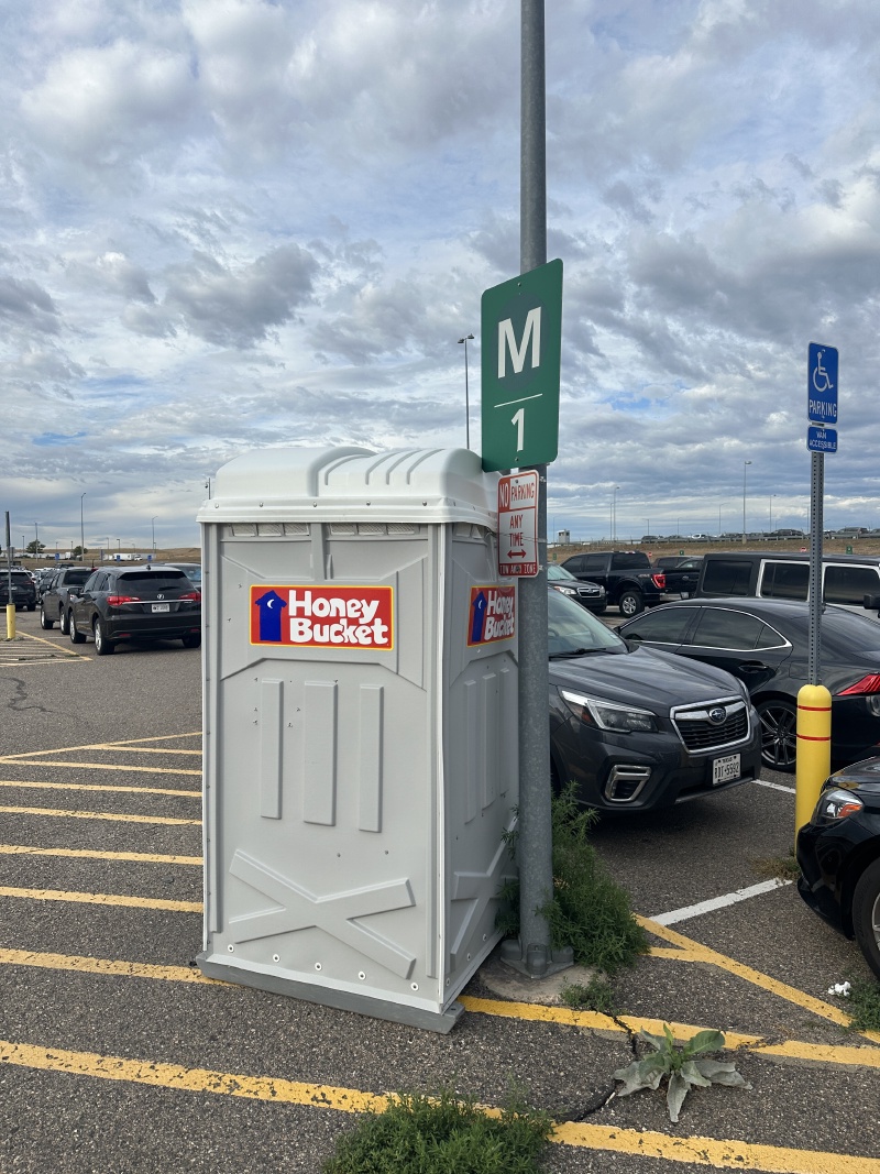 2024-08-22-Colorado-Jon-Adriana-17-DEN-parking.JPG