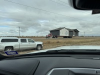 2024-10-30-South-Dakota-Pheasant-Hunting-14-big-house-on-highway.JPG