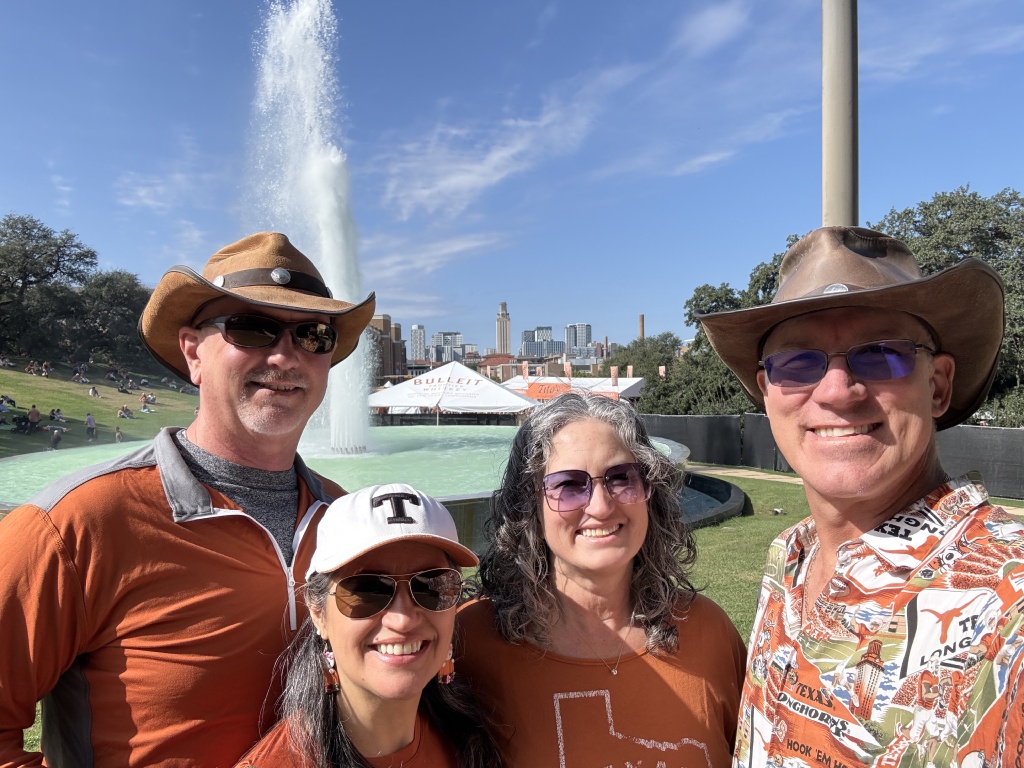 2025/09(September)/UT-Football/1024x768_2025-11-22-UT-Football-32-Mike-Graciela-Suzi-Travis.JPG