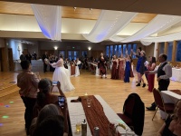2025-11-08-McKenzie-BenBeatty-Wedding-090-boquet-toss-Zeta.JPG