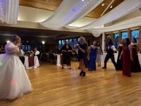2025-11-08-McKenzie-BenBeatty-Wedding-097-boquet-toss-Zeta.JPG