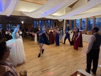 2025-11-08-McKenzie-BenBeatty-Wedding-098-boquet-toss-Zeta.JPG