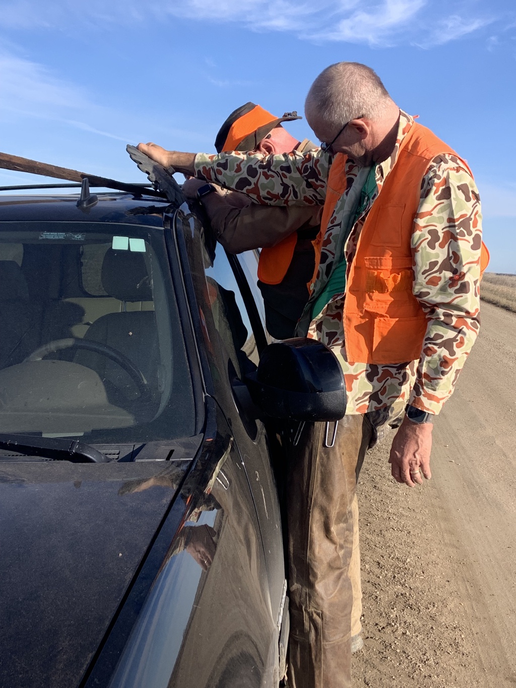 2025-11-12-SD-Pheasant-Hunting-29-Tim-Locked-Dans-Car.jpg