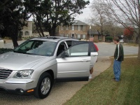 2004-12-24-Christmas-Eve-01-Justin-Katie-New-Car.JPG