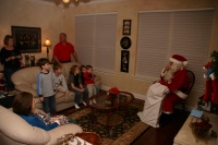 2007-12-24-Christmas-Eve-04-Santa-Janeen-Jim-Dax-Chance-Vale-Katie-Ian-Heather.JPG