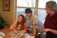 2012-12-25-Christmas-Day-07-gingerbread-house-Kyla-Dax-Katie.JPG