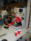 2000-12-02-Aaron-Bday-06-Kitchen-Kim-Aaron-cake.jpg